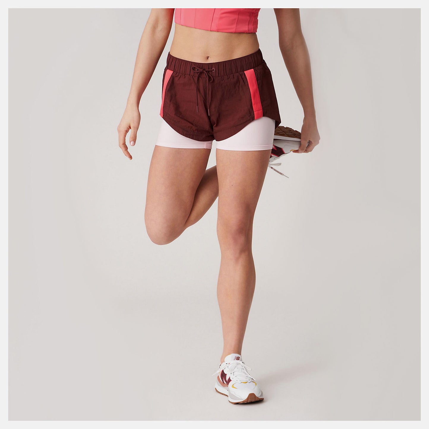 Bandier Woven tech Short | New Balance Clothing - Women