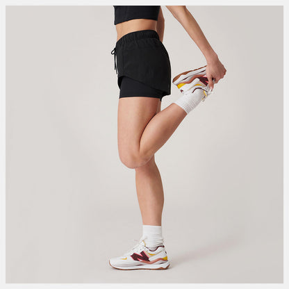 Bandier Woven tech Short | New Balance Clothing - Women
