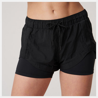 Bandier Woven tech Short | New Balance Clothing - Women