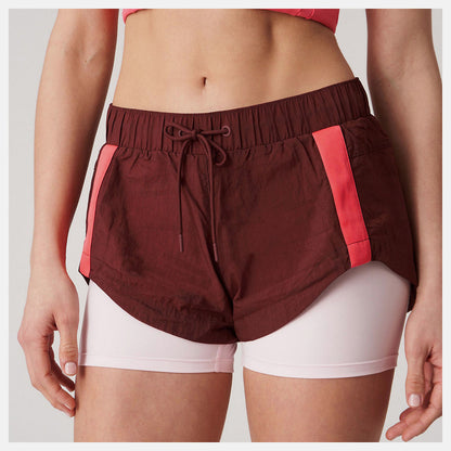 Bandier Woven tech Short | New Balance Clothing - Women
